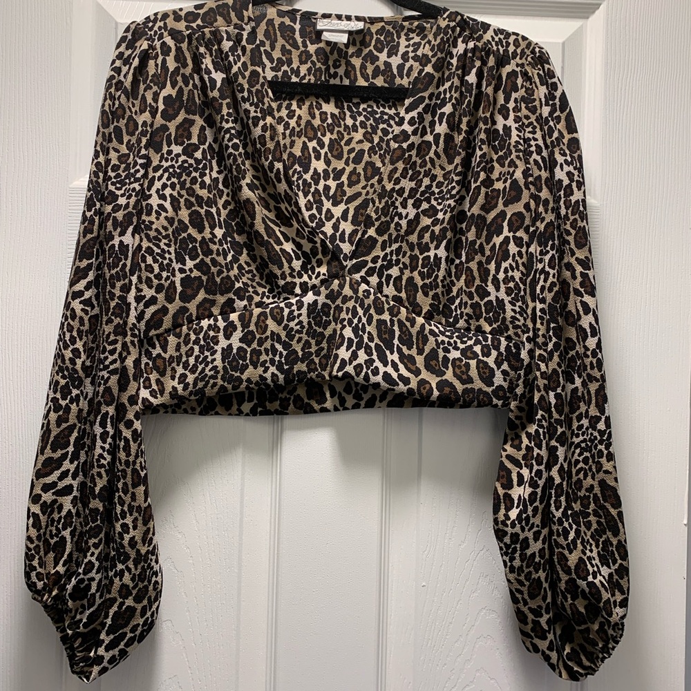 Lady De Couture leopard print blouse nwot. Never worn.
